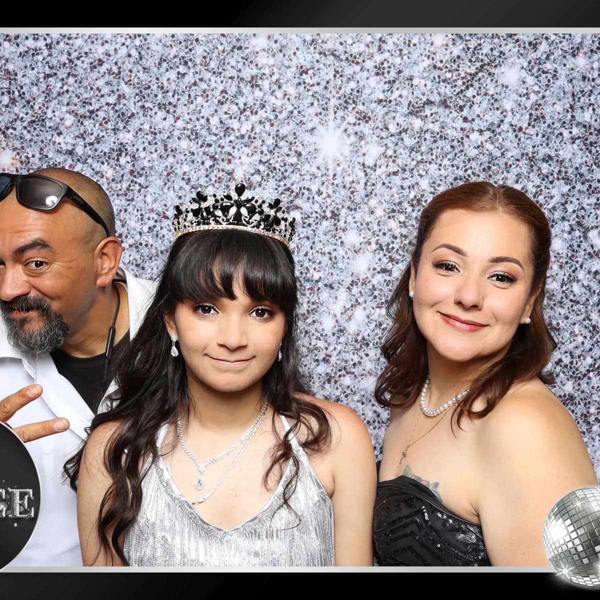 Quinceañera photo booth setup at Los Angeles reception venue — open air booth with custom backdrop, Captured Celebrations