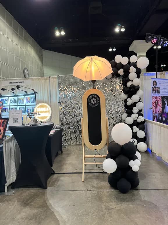 Mirror booth sample print — holiday party photo strip with festive design, Captured Celebrations Los Angeles