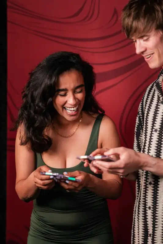 Guest holding custom trading card at Los Angeles corporate event — Captured Celebrations