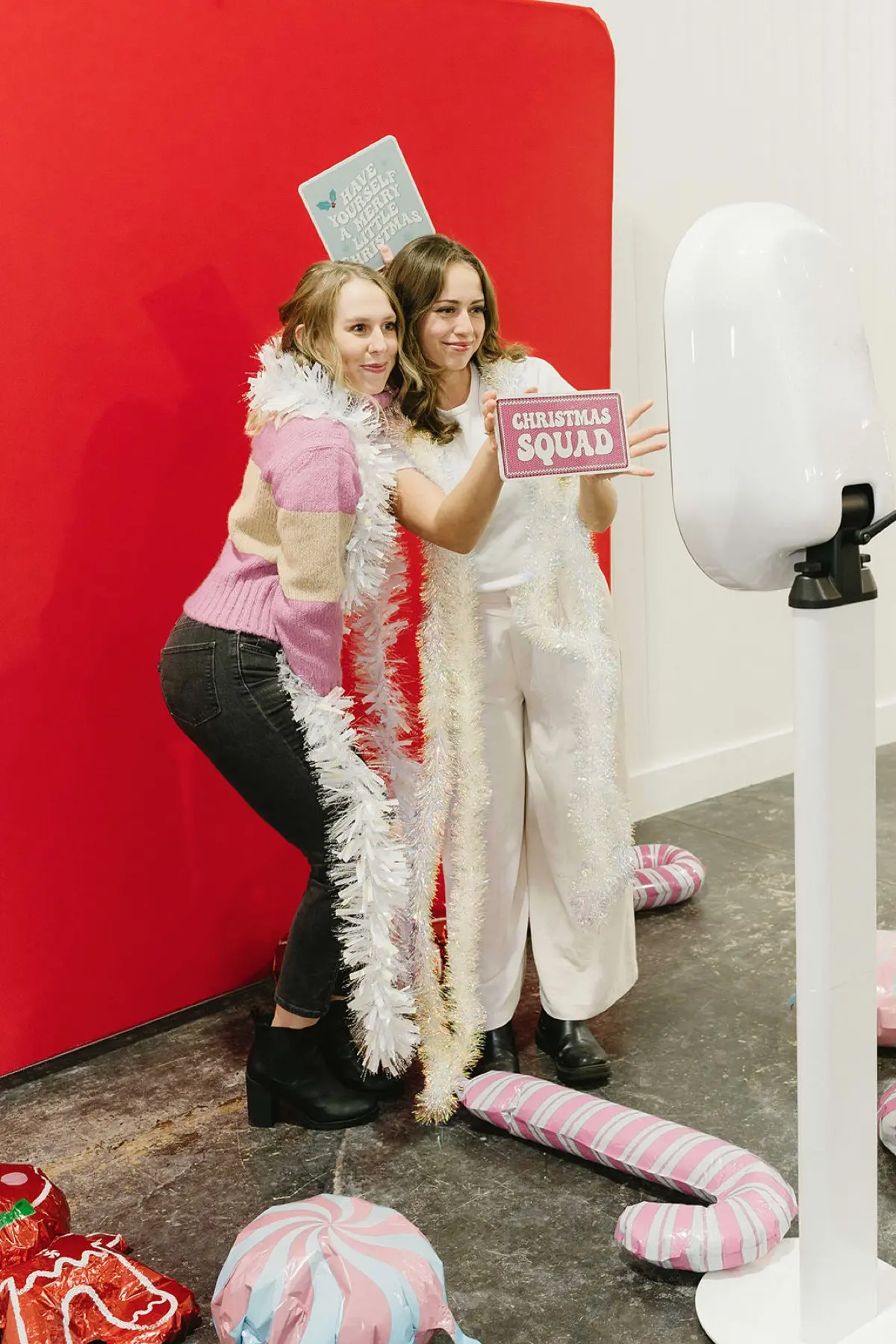 Christmas candy theme photo booth at a festive event