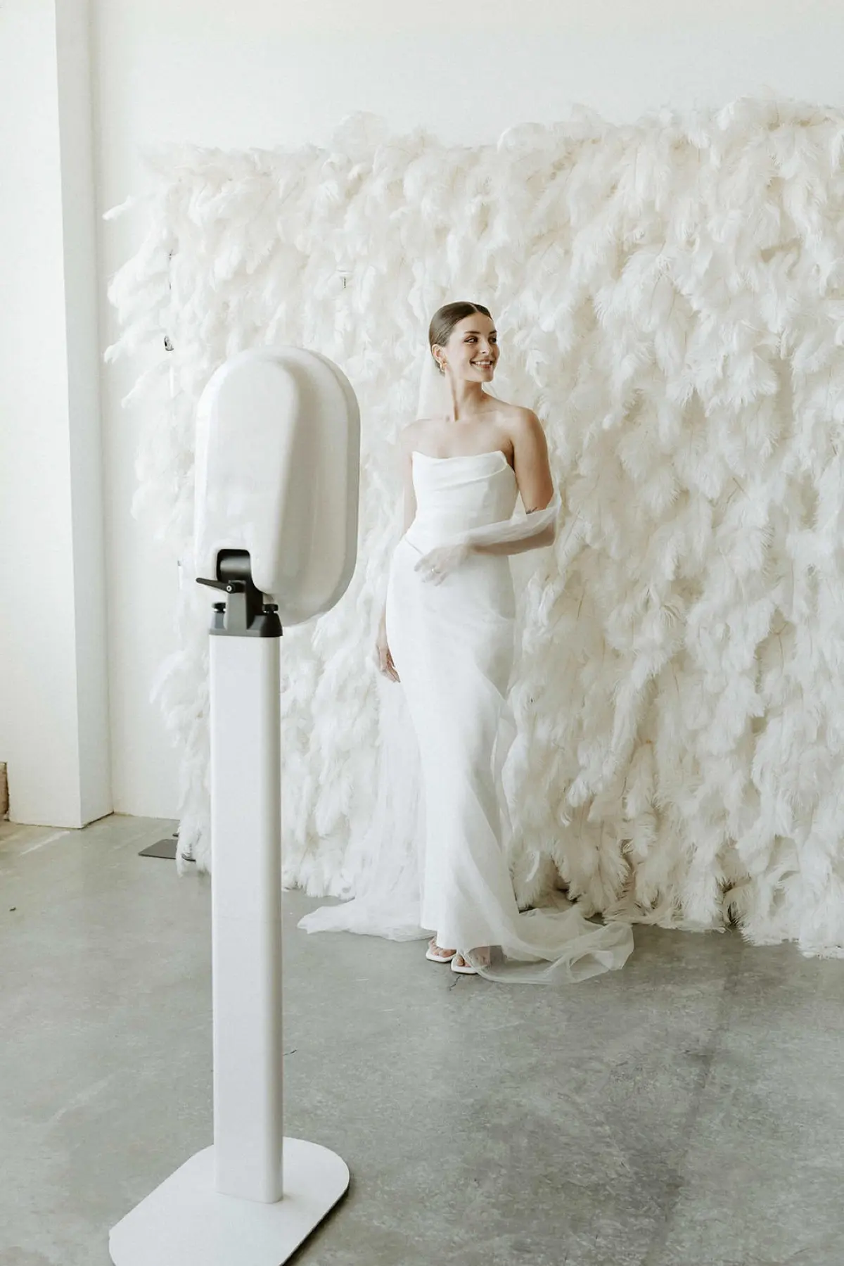 Feather and floral photo booth backdrop rental in Los Angeles