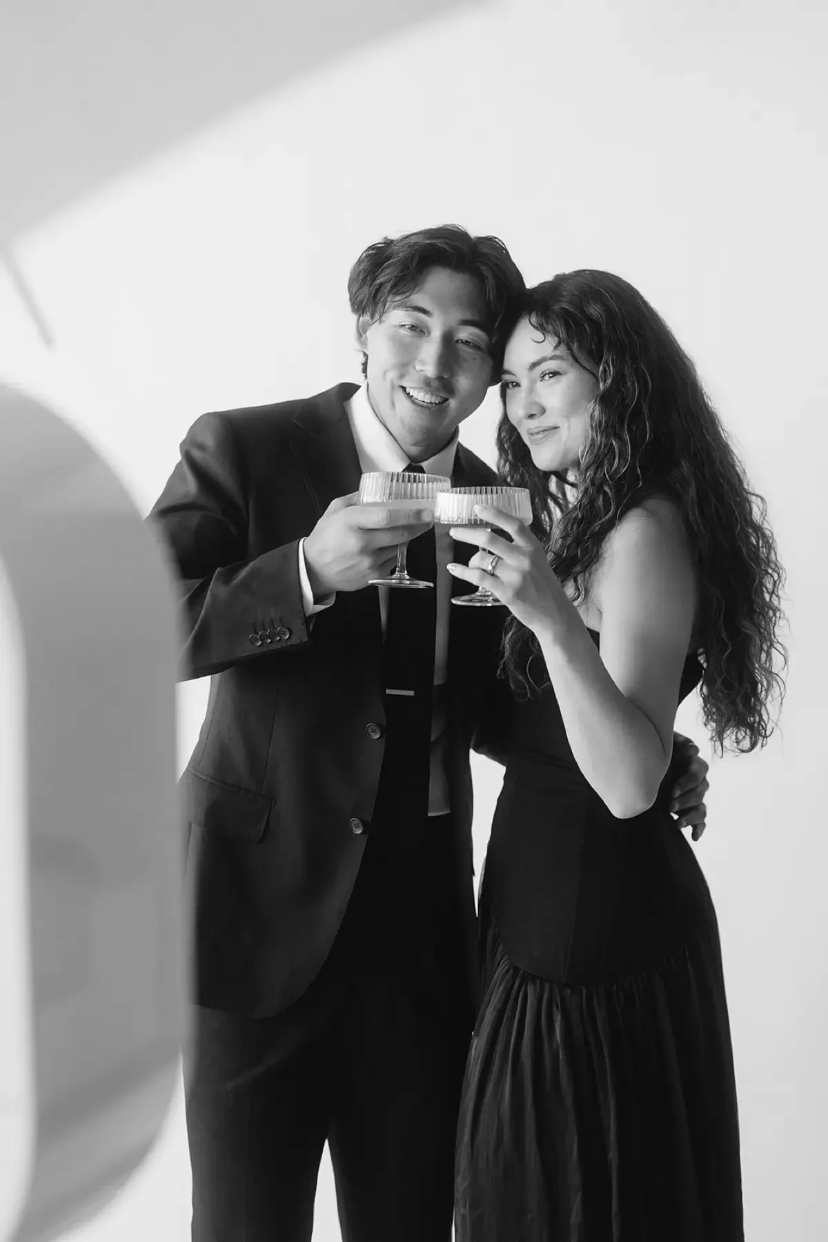 Glamorous black and white photo booth portrait at a wedding celebration