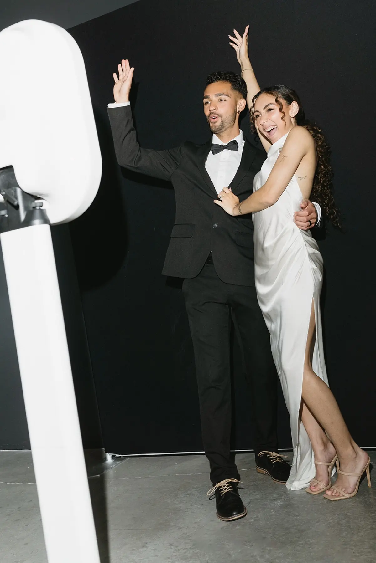 Late night open air photo booth rental with guests having fun