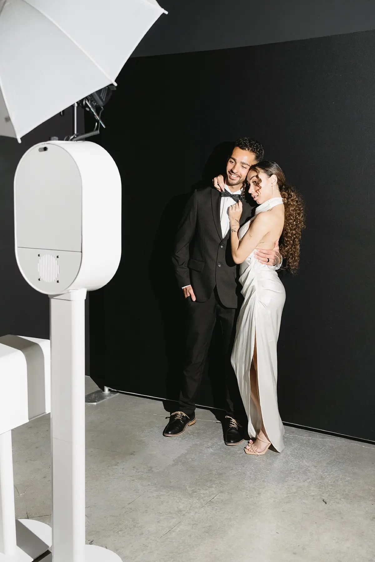 Late-night photo booth party with enthusiastic guests celebrating in Los Angeles