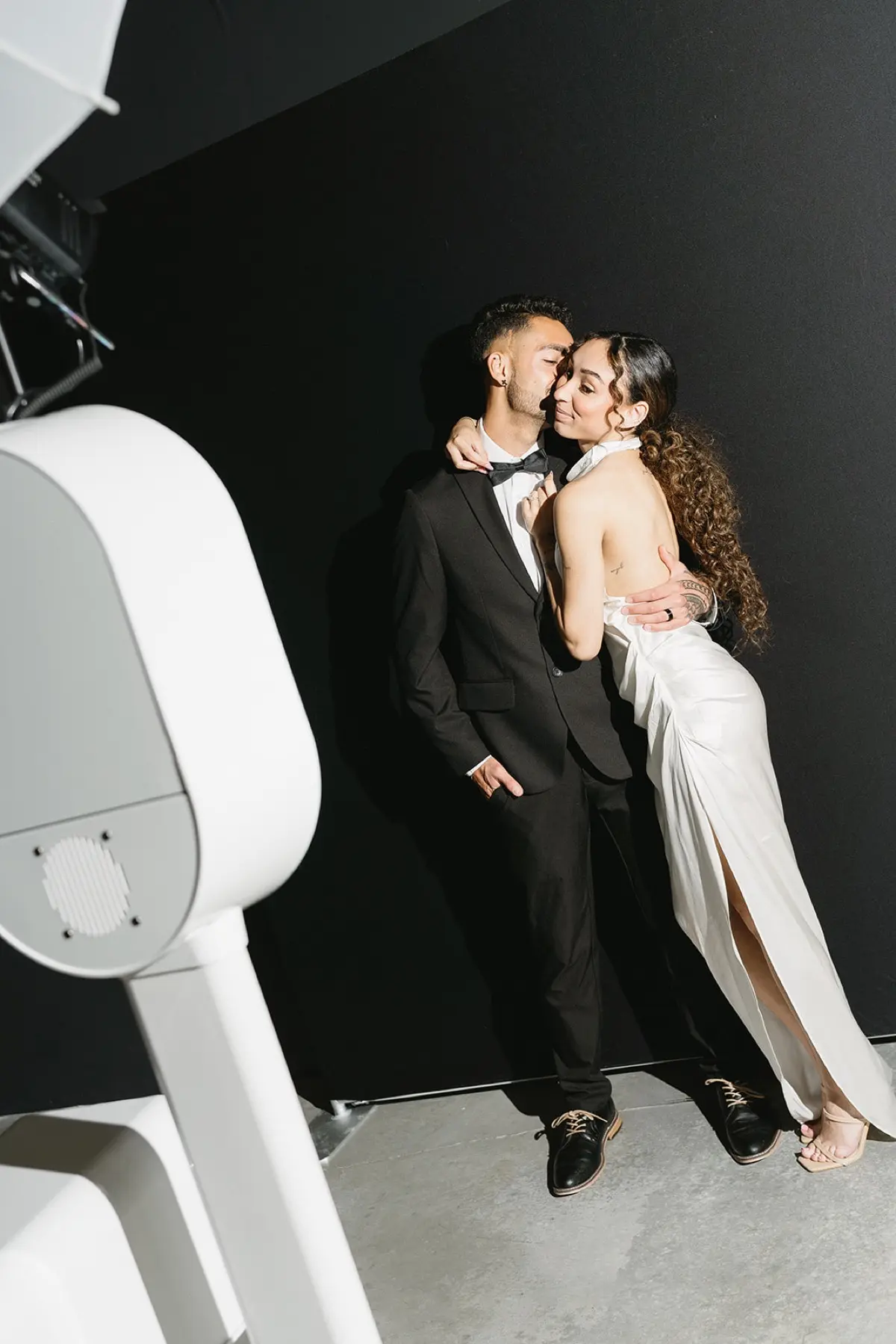 Late-night photo booth with party atmosphere and joyful guests in Los Angeles