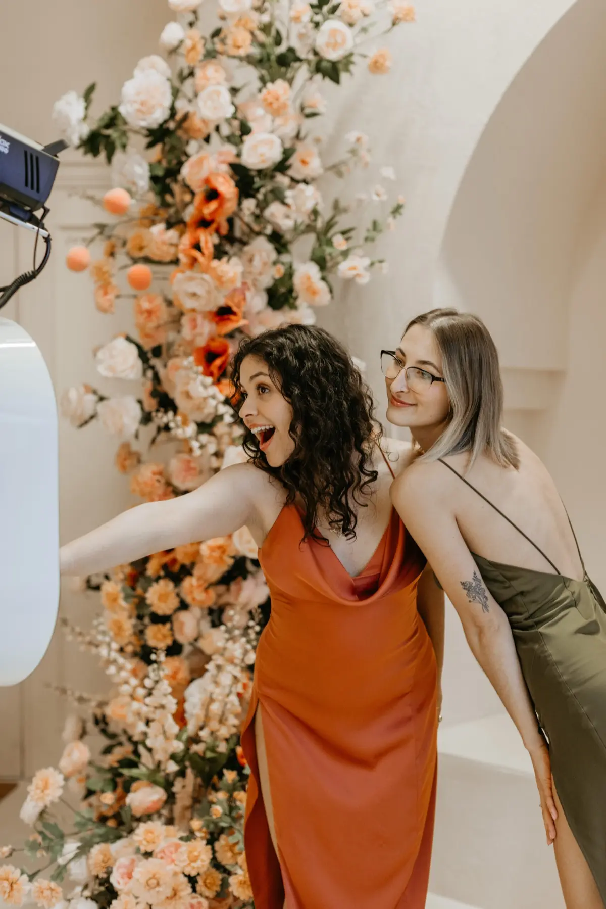 Peachy themed photo booth delivering red-carpet vibes at a Los Angeles event