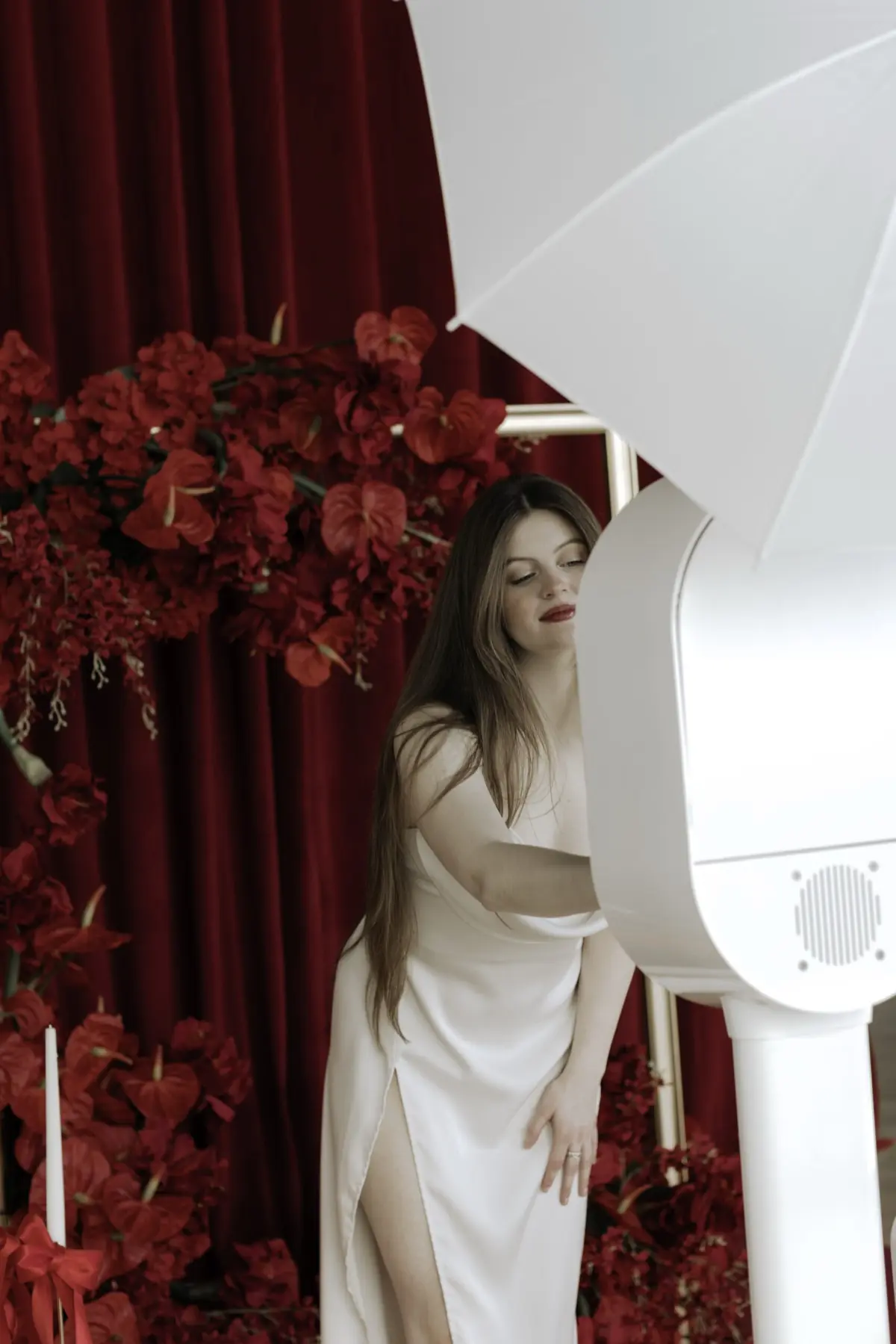 Red carpet photo booth event with professional lighting and branded backdrop for a corporate gala