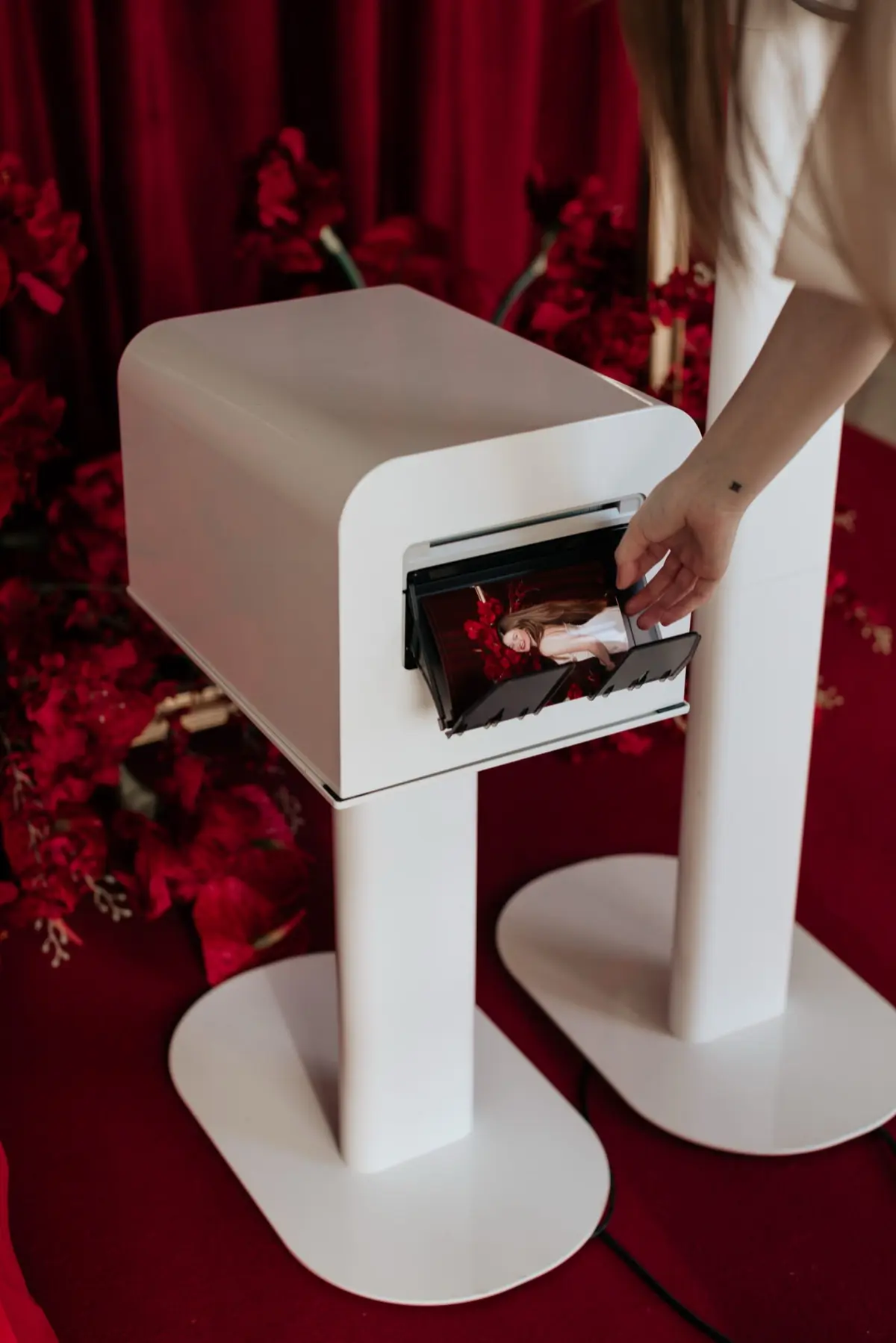 Red carpet photo booth setup at a glamorous Los Angeles celebration