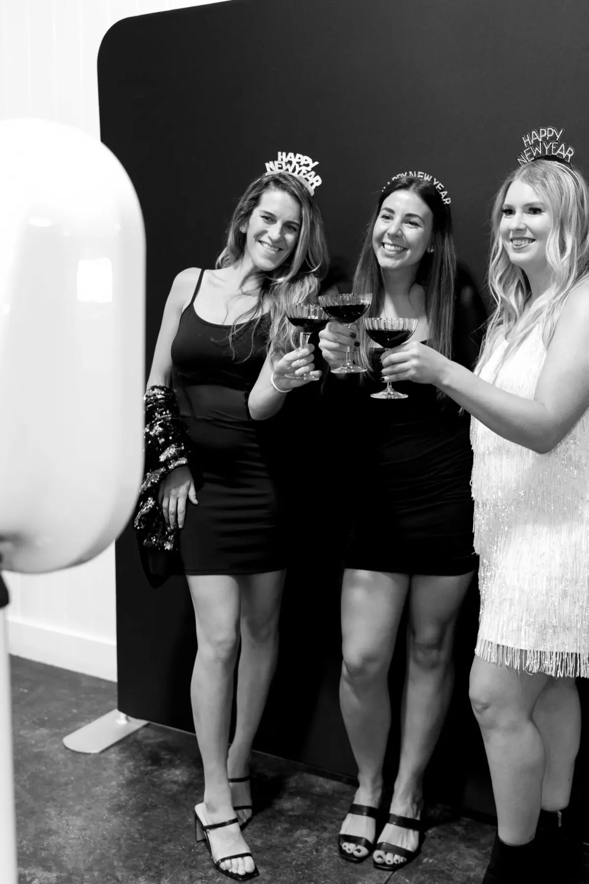 Spotlight photo booth at a festive Burbank event with dramatic lighting