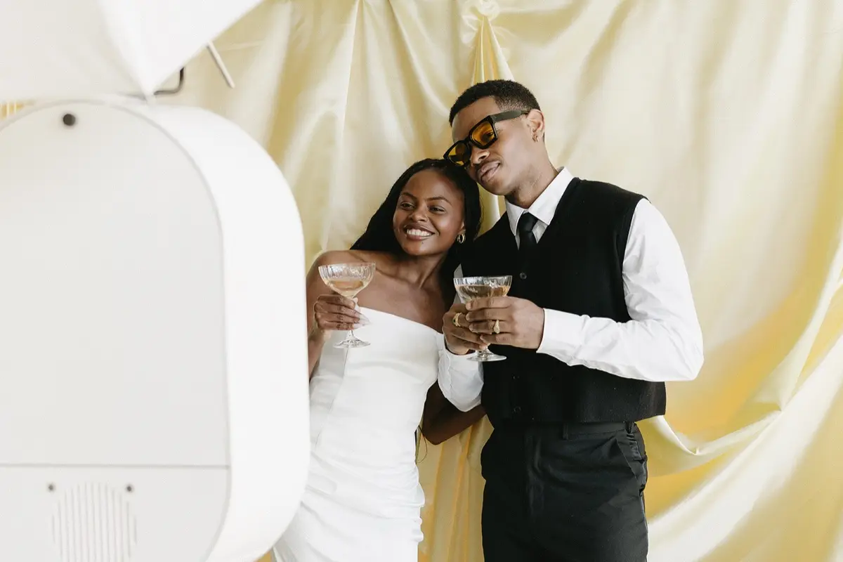 Gold metallic photo booth with baby shower decorations in Los Angeles