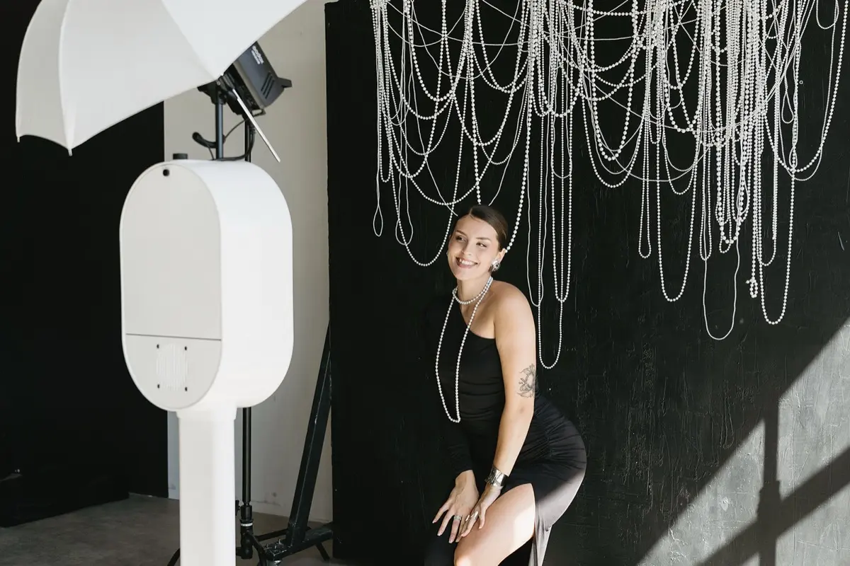 Studio photo booth with pearl elegant backdrop