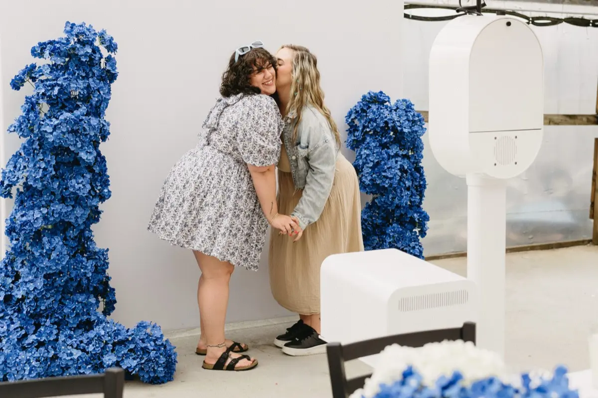 Something blue photo booth with romantic wedding decor in Los Angeles