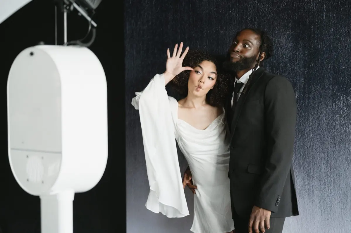 Toast dark photo booth event scene with sophisticated styling in Los Angeles